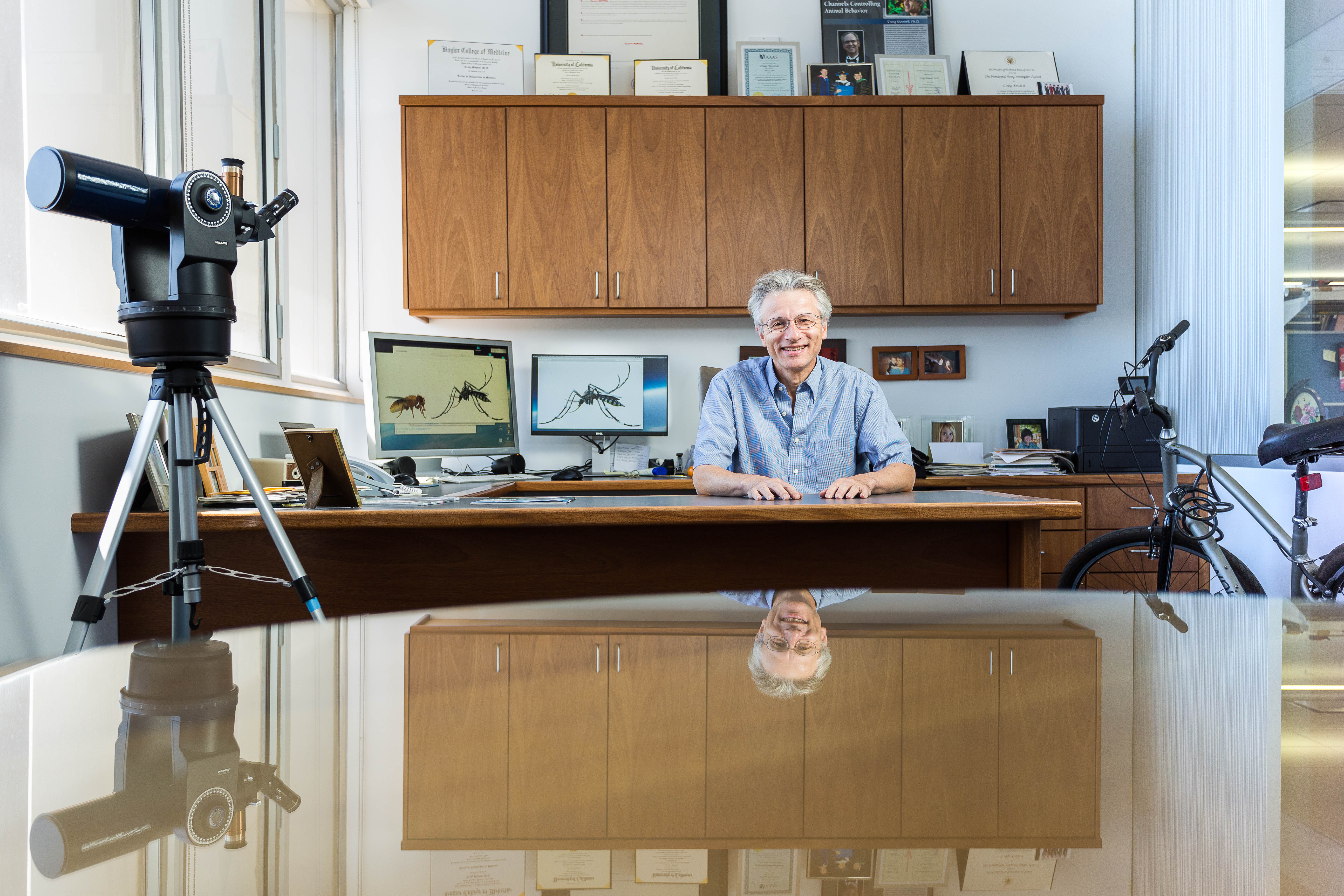 Craig Montell sitting at his desk. 